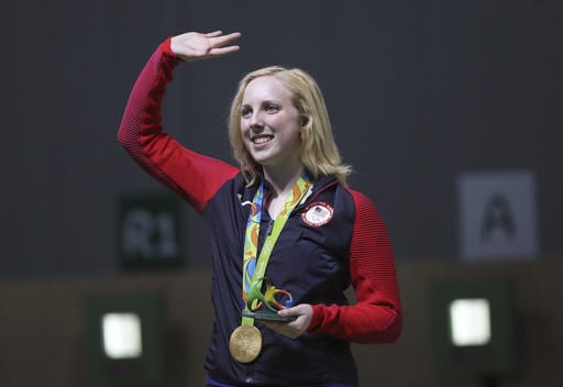 Virginia Thrasher of the United States waves after she received the gold medal for the Women's 10m Air Rifle competition at Olympic Shooting Center at the 2016 Summer Olympics in Rio de Janeiro, Brazil, Saturday, Aug. 6, 2016. (AP Photo/Eugene Hoshiko)