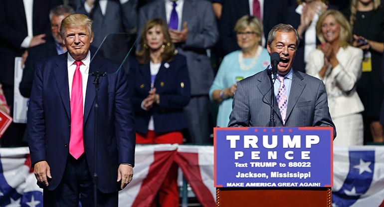 Nigel Farage, ex-leader of the British UKIP party, speaks as Republican presidential candidate Donald Trump, left, listens, at Trump's campaign rally in Jackson, Miss., Wednesday, Aug. 24, 2016. (AP Photo/Gerald Herbert.)