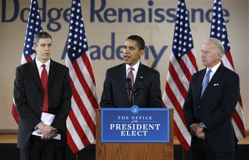 President-elect Barack Obama introduces Arne Duncan, left, as his Education Secretary-designate, Tuesday, Dec. 16, 2008, during a news conference at the Dodge Renaissance Academy in Chicago. Vice President-elect Joe Biden is at right. (AP Photo)